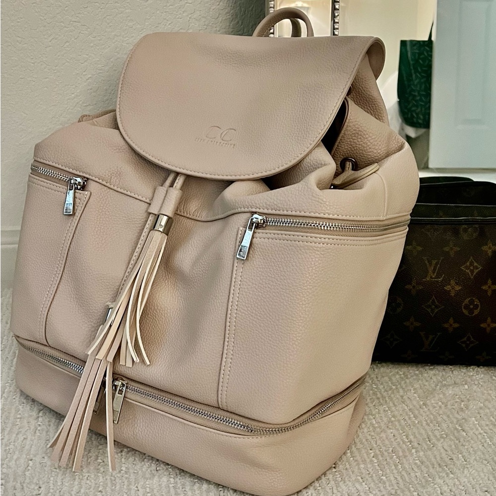 Never used**  Baby diaper bag or stylish backpack - perfect for both!